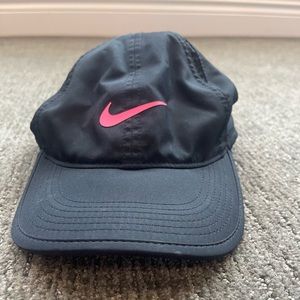 Black Nike hat with hot pink Nike sign